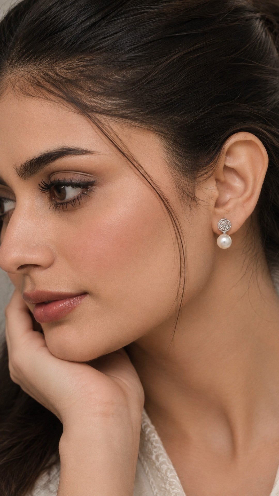 Enchanted Rose pearl top from the Silver Romance set, worn on the ear
